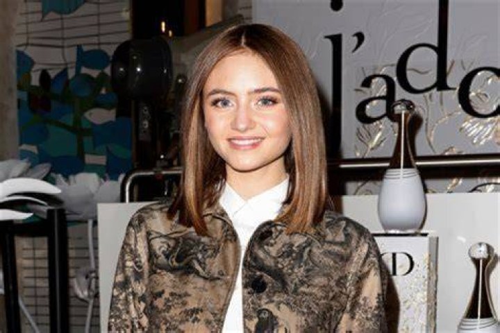 Daughter of supermodel, singer parents |