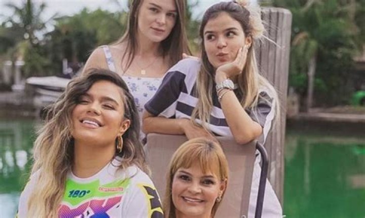 Karol G And Her Sisters