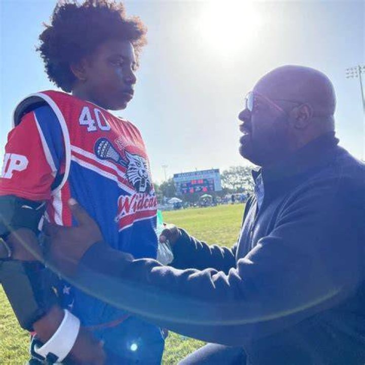 Meet son Carlos Jr. Woods |