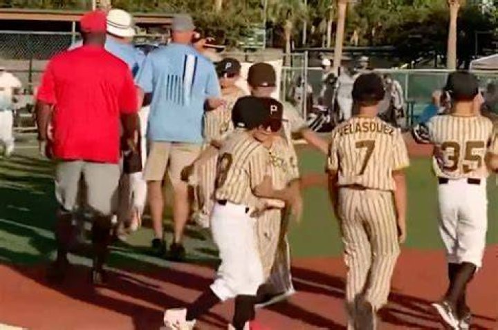 Ow! That coach hit me hard: Kenneth Wendt, a little league coach rough-housing 9-year-old juni