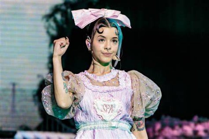 Unveiling Melanie Martinez's Enigmatic Smile: Discoveries And Insights