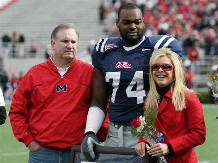 Who is Carlos Oher, the brother of Michael Oher? |